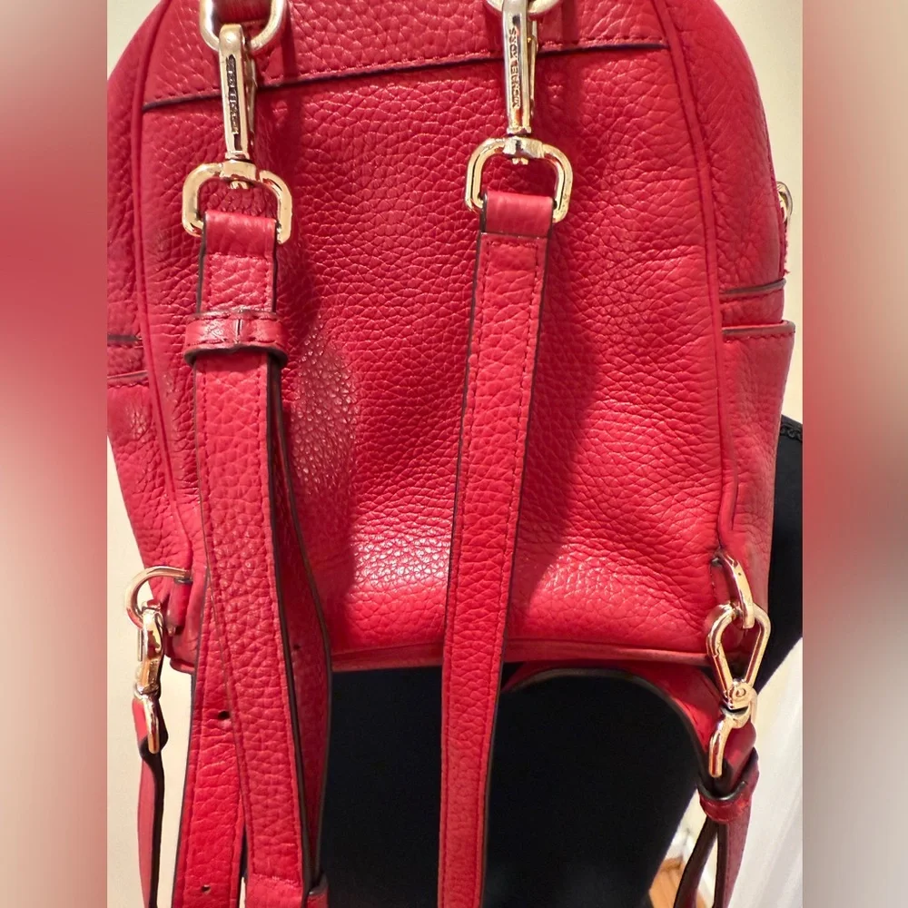 Michael Kors Abbey XS Studded Red Backpack with Gold Studs
Size 7 by 8 by 3 - Picture 7 of 16